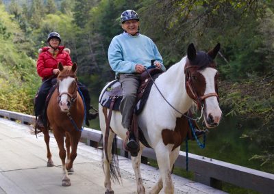 CWR Senior Couple Riding Horses